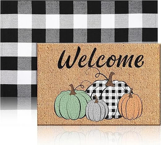Cork welcome mat featuring colorful pumpkins and a black and white checkered background, perfect for fall home decor.