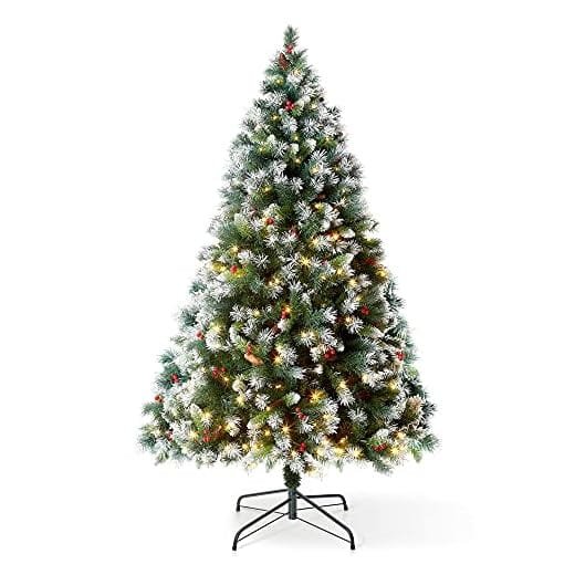 Artificial Christmas tree with snow accents and colorful ornaments, perfect for festive holiday decorations.