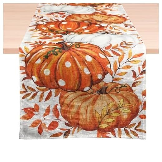 Table runner featuring colorful pumpkins and autumn leaves, perfect for seasonal decor and festive gatherings.
